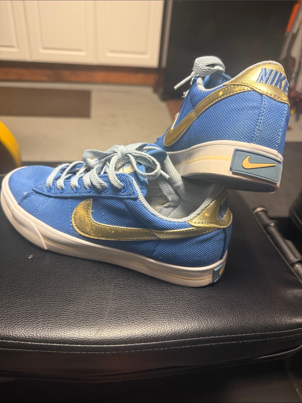 Nike Light Blue Canvas Sneakers with Gold Swoosh